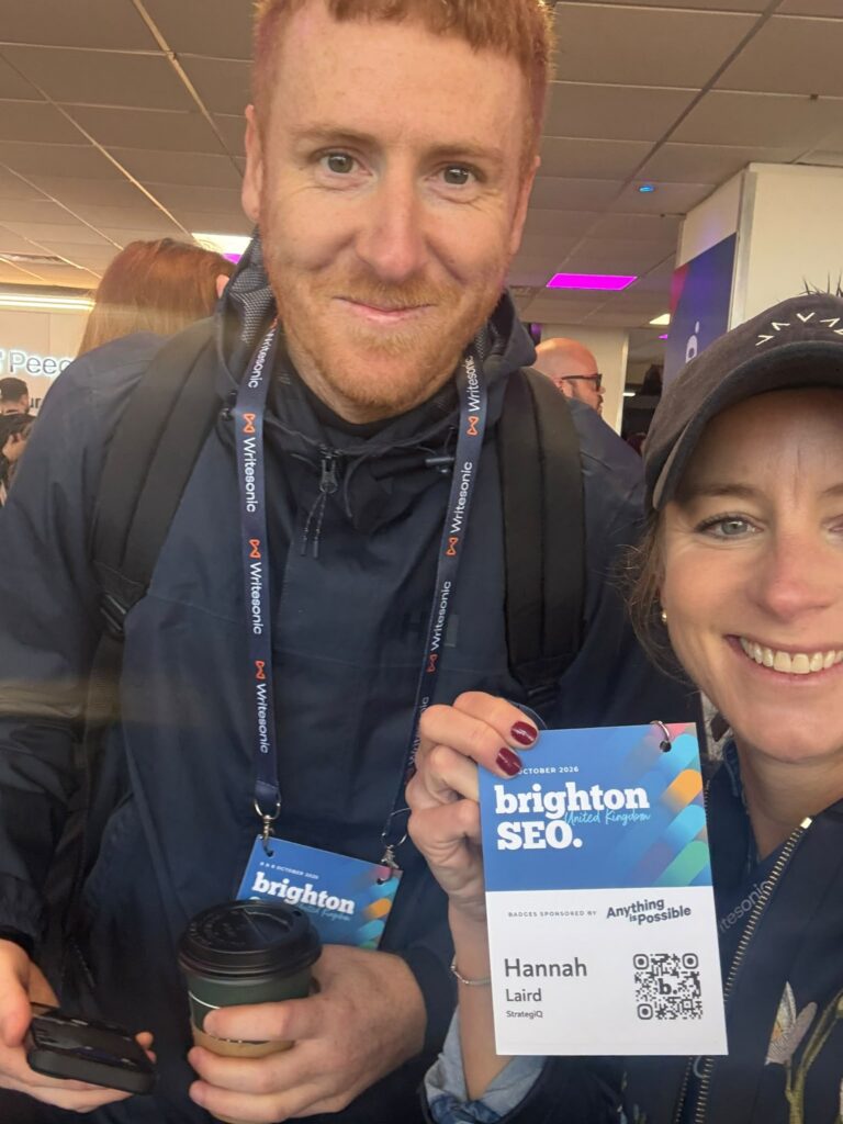 Hannah and Dan with their BrightonSEO badges