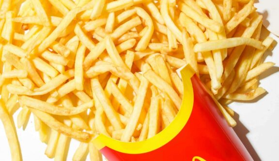 Macdonald's fries spilling out of the packet
